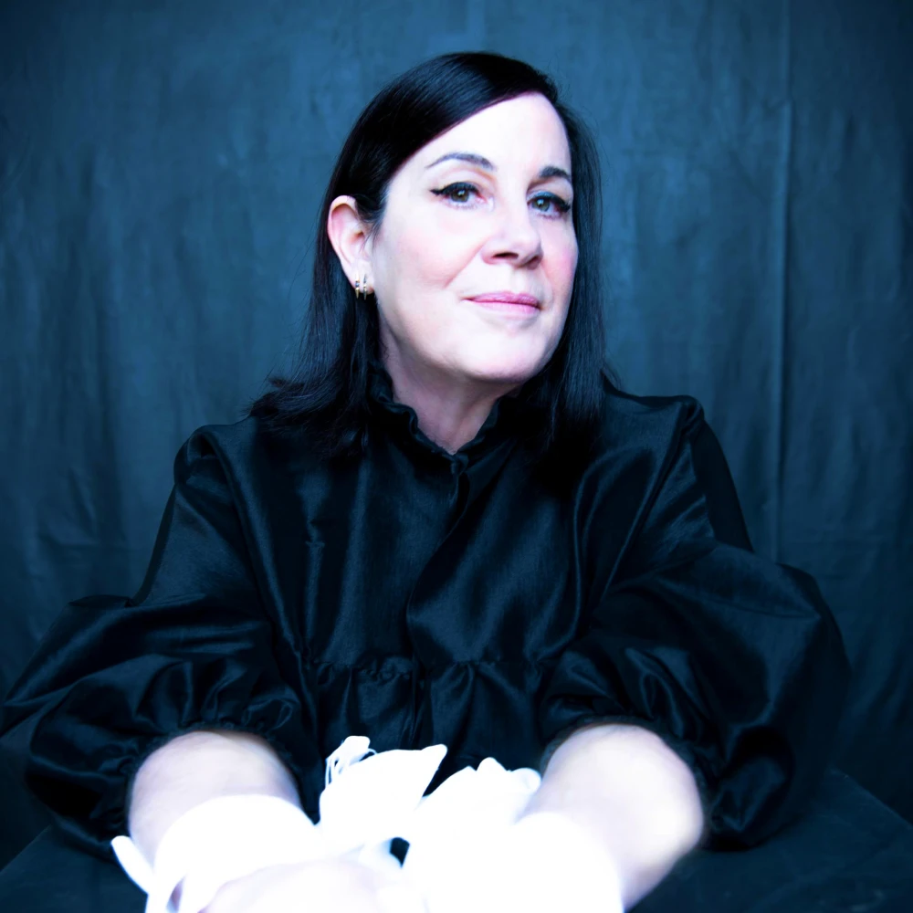 Arianne Phillips in a dark grey background