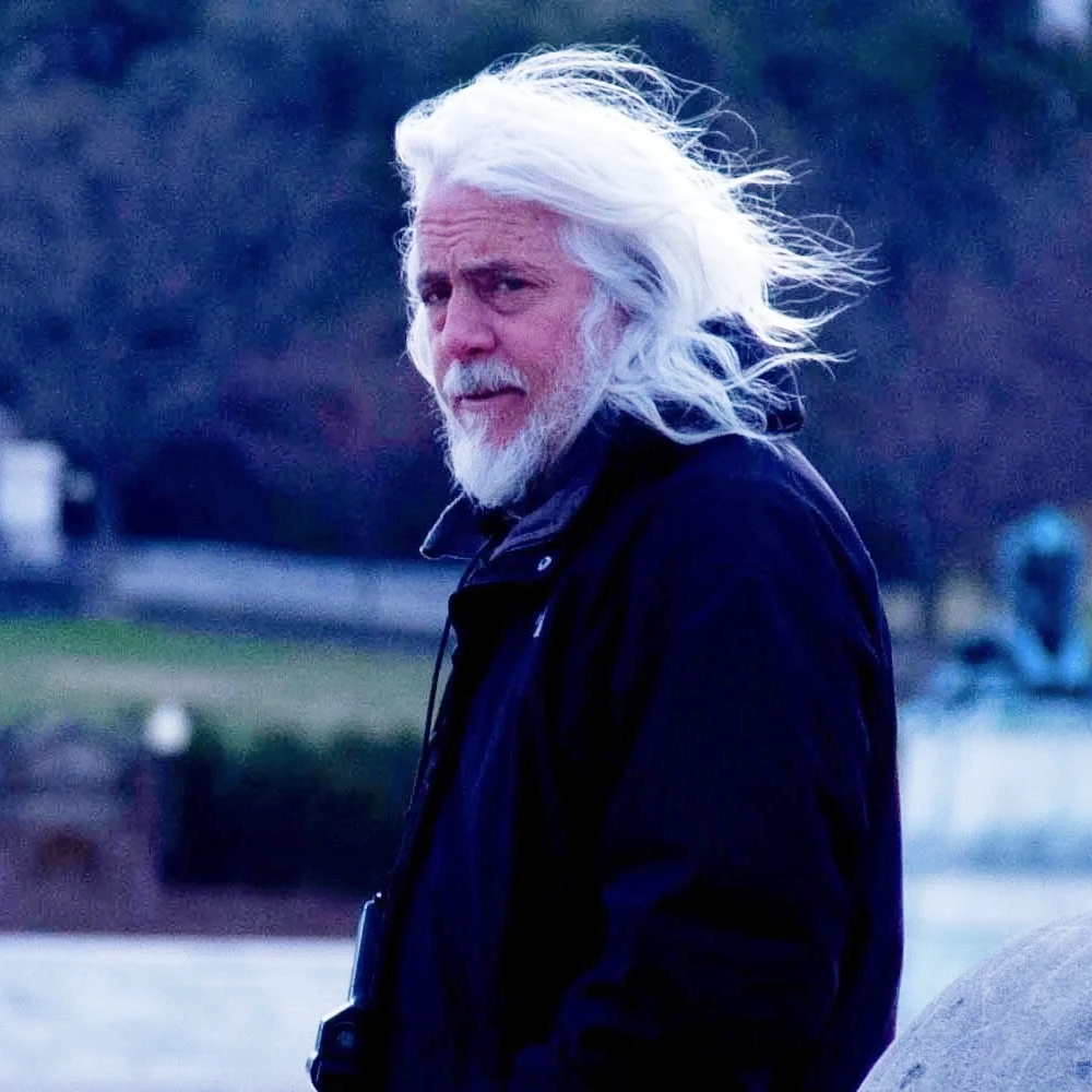Robert Richardson with hair blowing in the wind