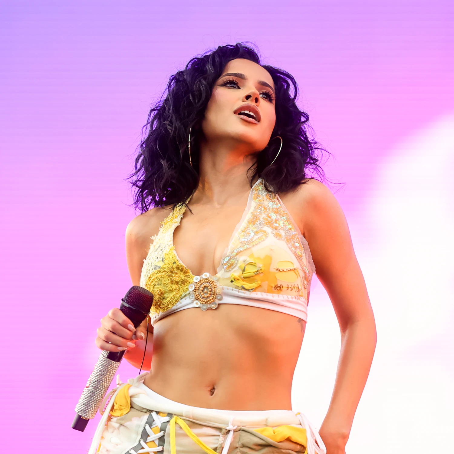 Becky G singing on stage